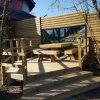 Wooden garden furniture in the Grand Nord Lodge.